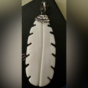 Beautiful mother of pearl feather pendant with rhinestones